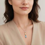 14K White and Yellow Gold Diamond and Marquise Blue Topaz Drop Necklace – NK7880M45BT-Gabriel & Co.-Renee Taylor Gallery