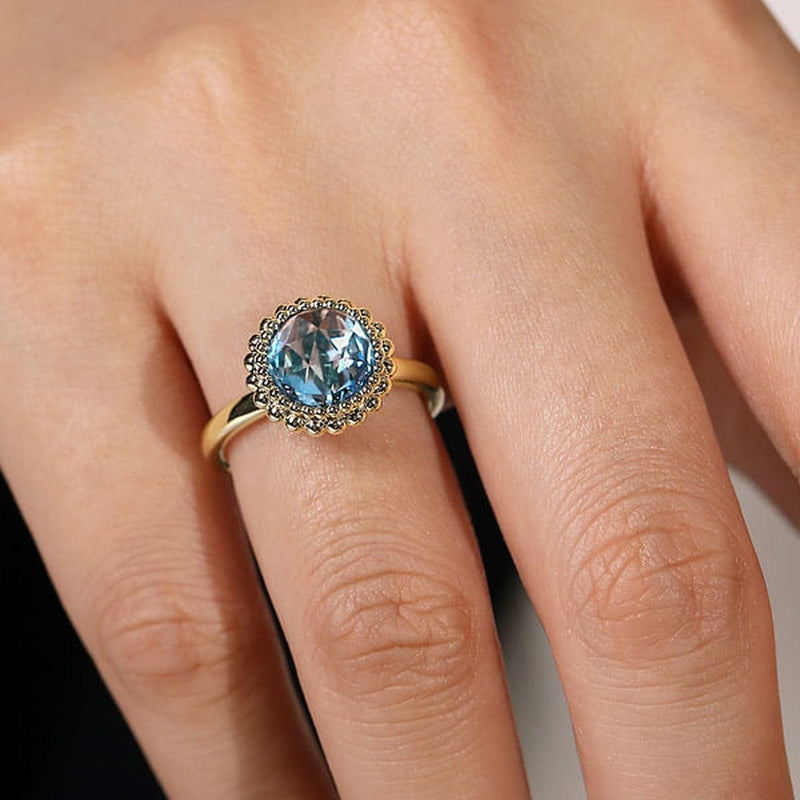 14K Yellow Gold Round Blue Topaz Bezel Set Ring w/ Bujukan Bead Halo - LR51792Y4JBT-Gabriel & Co.-Renee Taylor Gallery